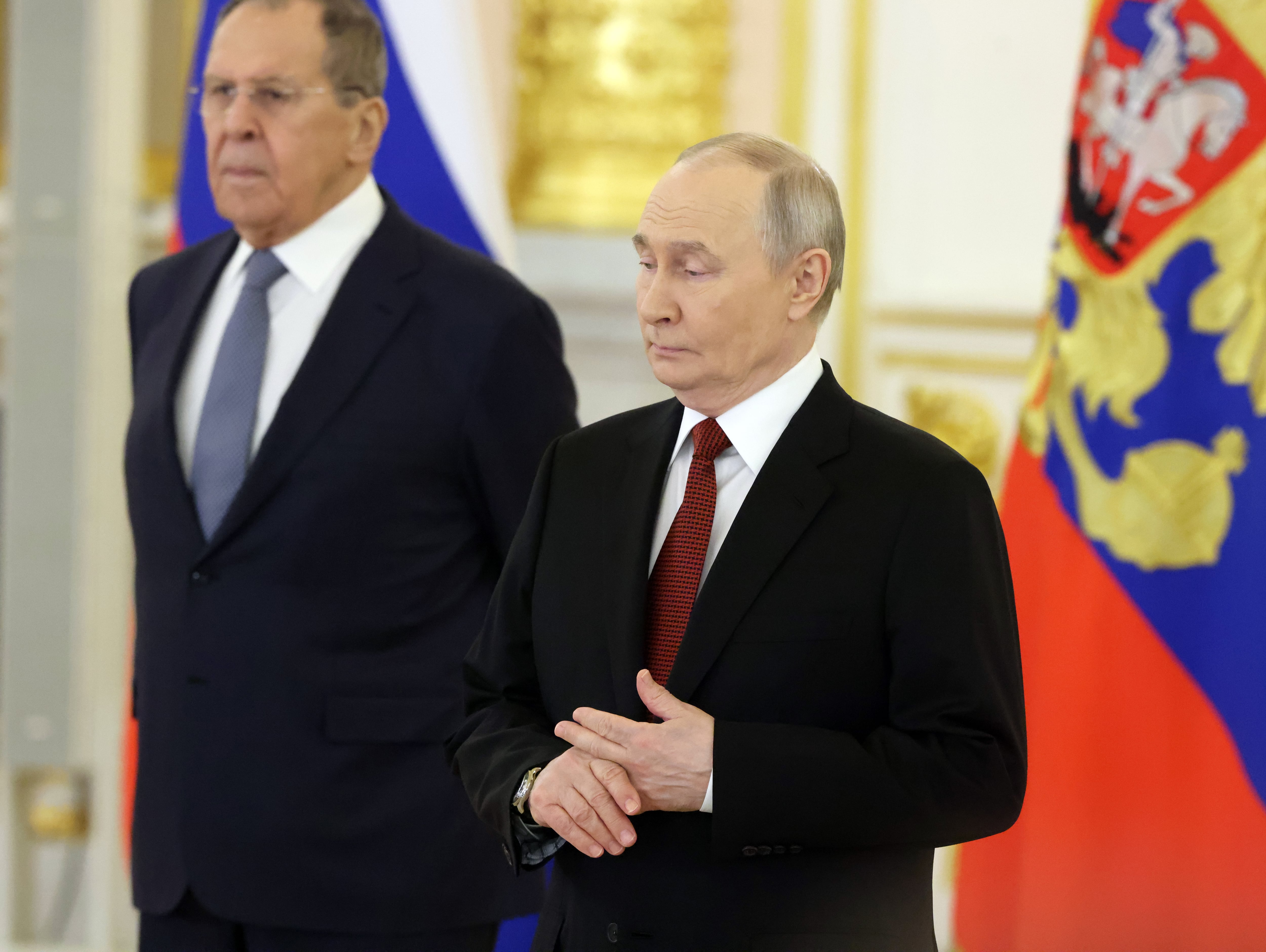 Vladimir Putin junto al ministro de Exteriores ruso, Sergei Lavrov, en un acto en el Kremlin este mes de enero