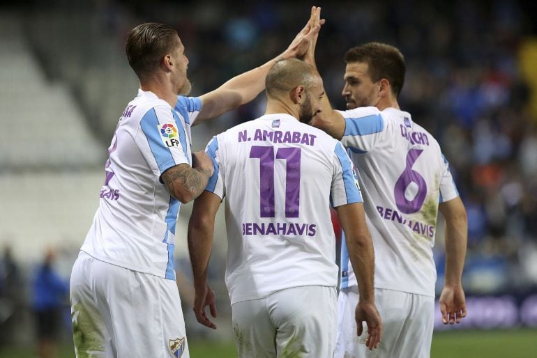 Camacho, Albentosa y Amrabat celebran el segundo gol del Málaga al Celta