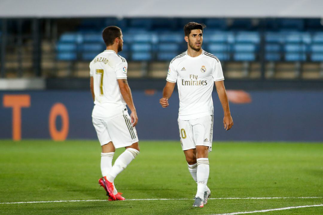 Hazard y Asensio en un partido con el Real Madrid