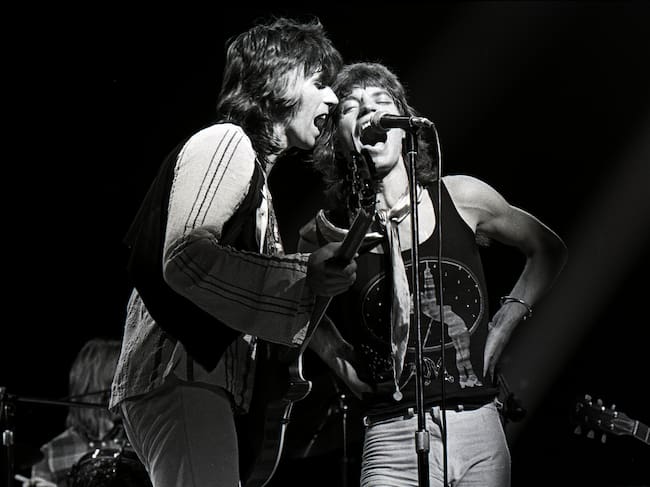 Jagger y Richards durante un concierto en los años 70