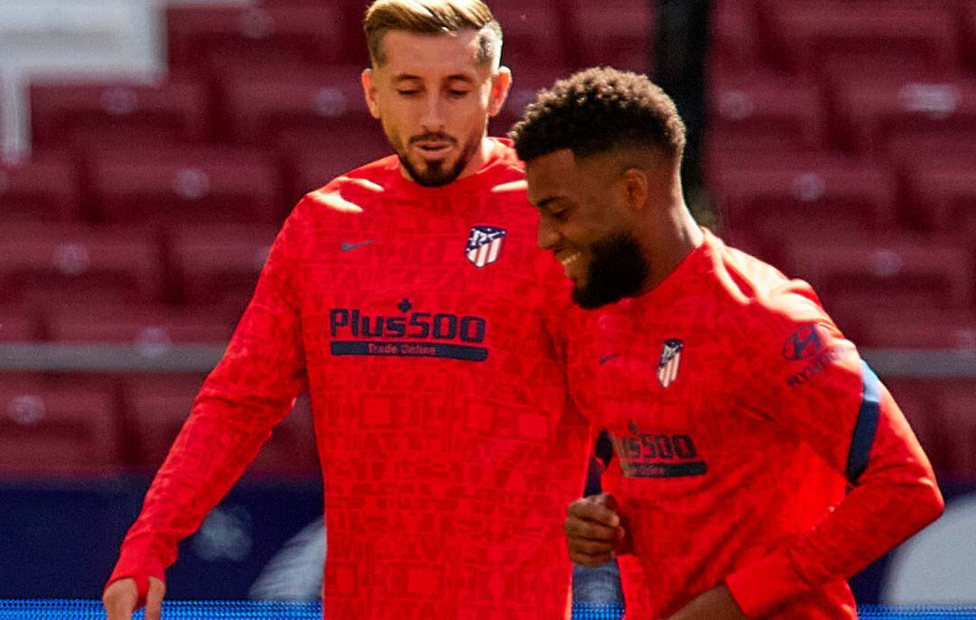 Héctor Herrera y Thomas Lemar, en un entrenamiento del Atlético de Madrid.