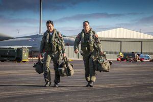 Dos pilotos a punto de subir a su avión en la Base albaceteña