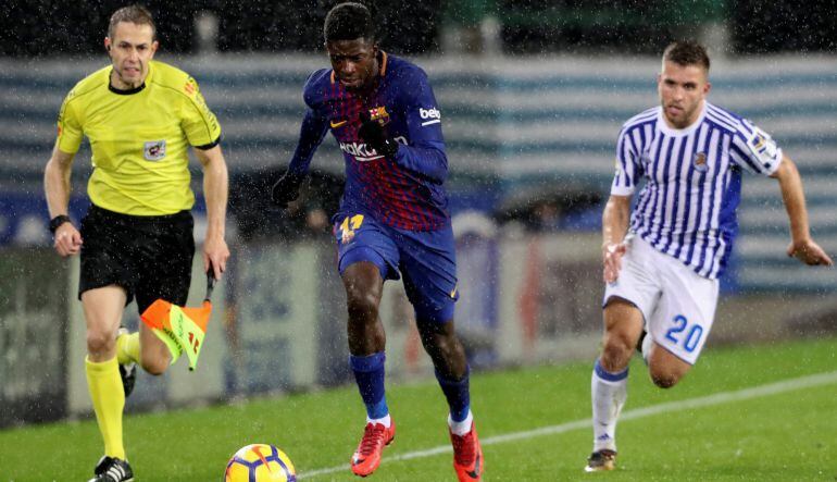 Dembélé, en una carrera mano a mano con Kevin Rodrigues