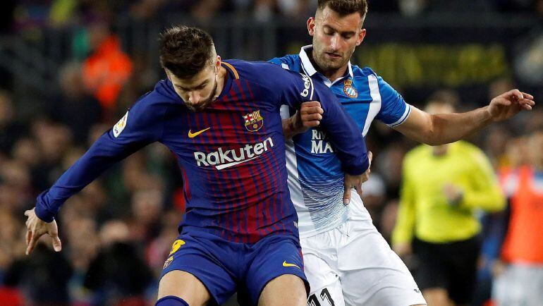 Piqué y Baptistao, en el partido de Copa entre Espanyol y Barcelona.