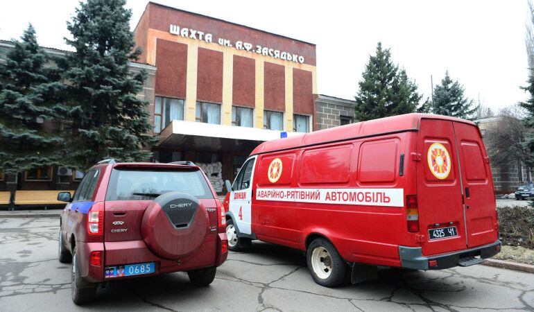 This picture shows an ambulance parked  in front of a coal mine in Donetsk after a blast on March 4, 2015. One miner was killed and 14 were injured, as 47 were missing after an explosion occured in a coal mine in Donetsk, were 207 miners were working at t