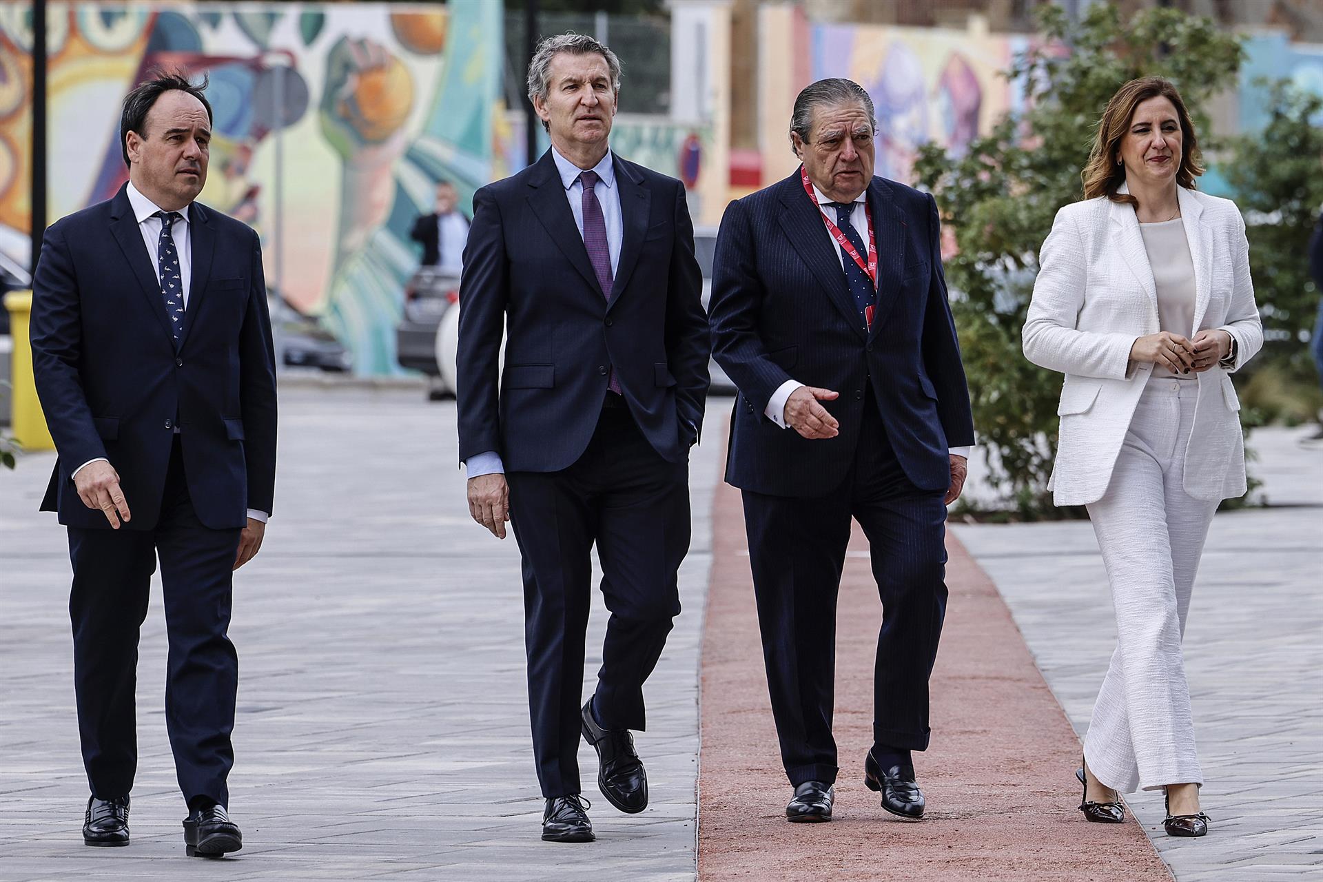 El presidente de la Generalitat, Juanfran Pérez Llorca; el presidente del PP, Alberto Núñez Feijóo; el presidente de AVE, Vicente Boluda, y la alcaldesa de Valencia, María José Catalá. durante la Asamblea General AVE
