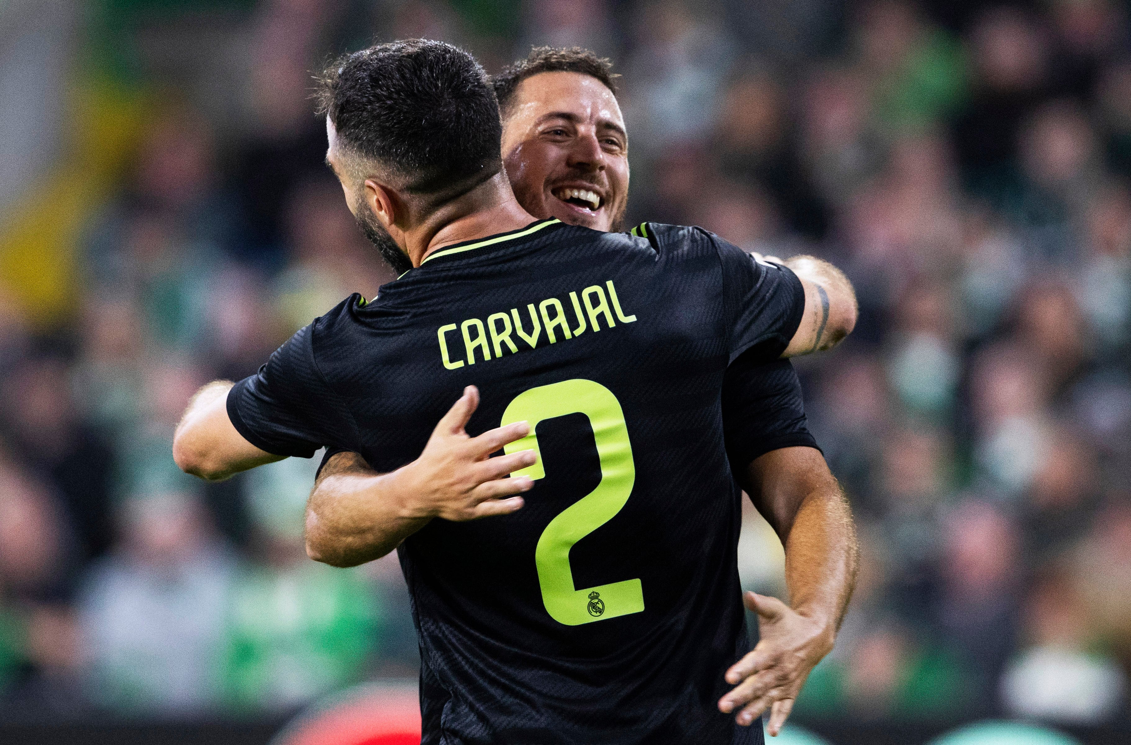 Carvajal y Hazard celebran el gol del belga ante el Celtic.