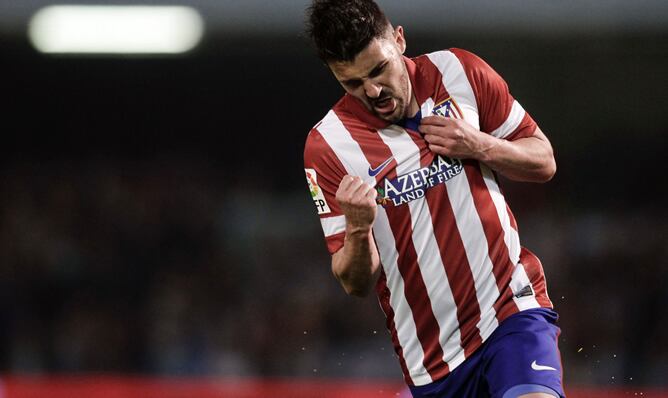 David Villa celebra uno de sus goles al Celta en Balaidos.