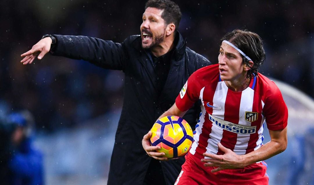 Diego Simeone y Filpe Luis.