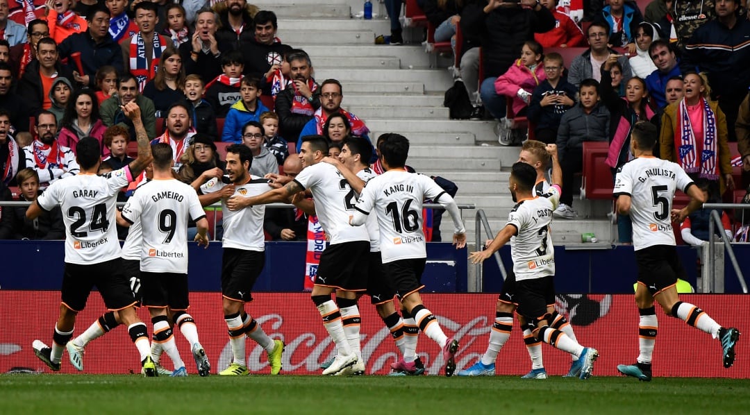 El Valencia celebrando el gol del empate