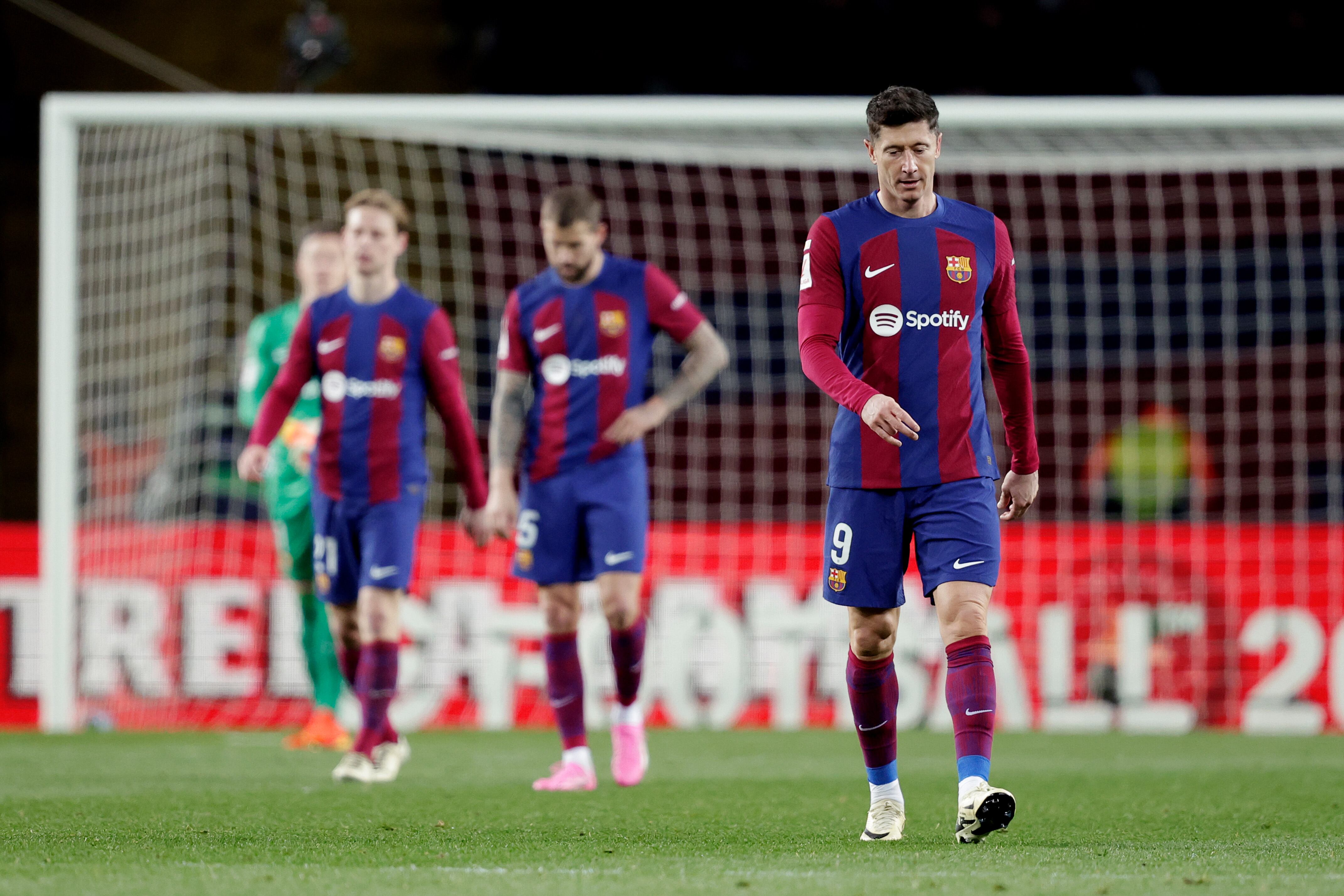 BARCELONA, SPAIN - FEBRUARY 11: Robert Lewandowski of FC Barcelona disappointed   during the LaLiga EA Sports  match between FC Barcelona v Granada at the Lluis Companys Olympic Stadium on February 11, 2024 in Barcelona Spain (Photo by David S. Bustamante/Soccrates/Getty Images)