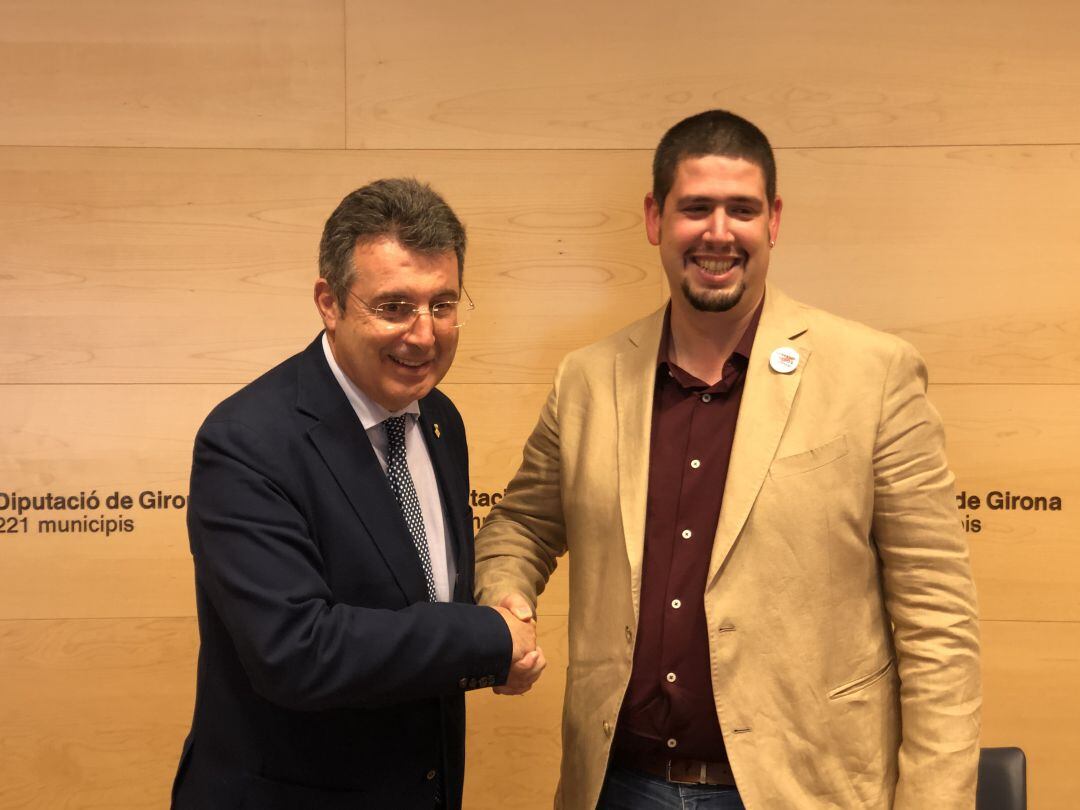 Foto del pacte amb Miquel Noguer (JxCat) i Pau Presas (ERC)