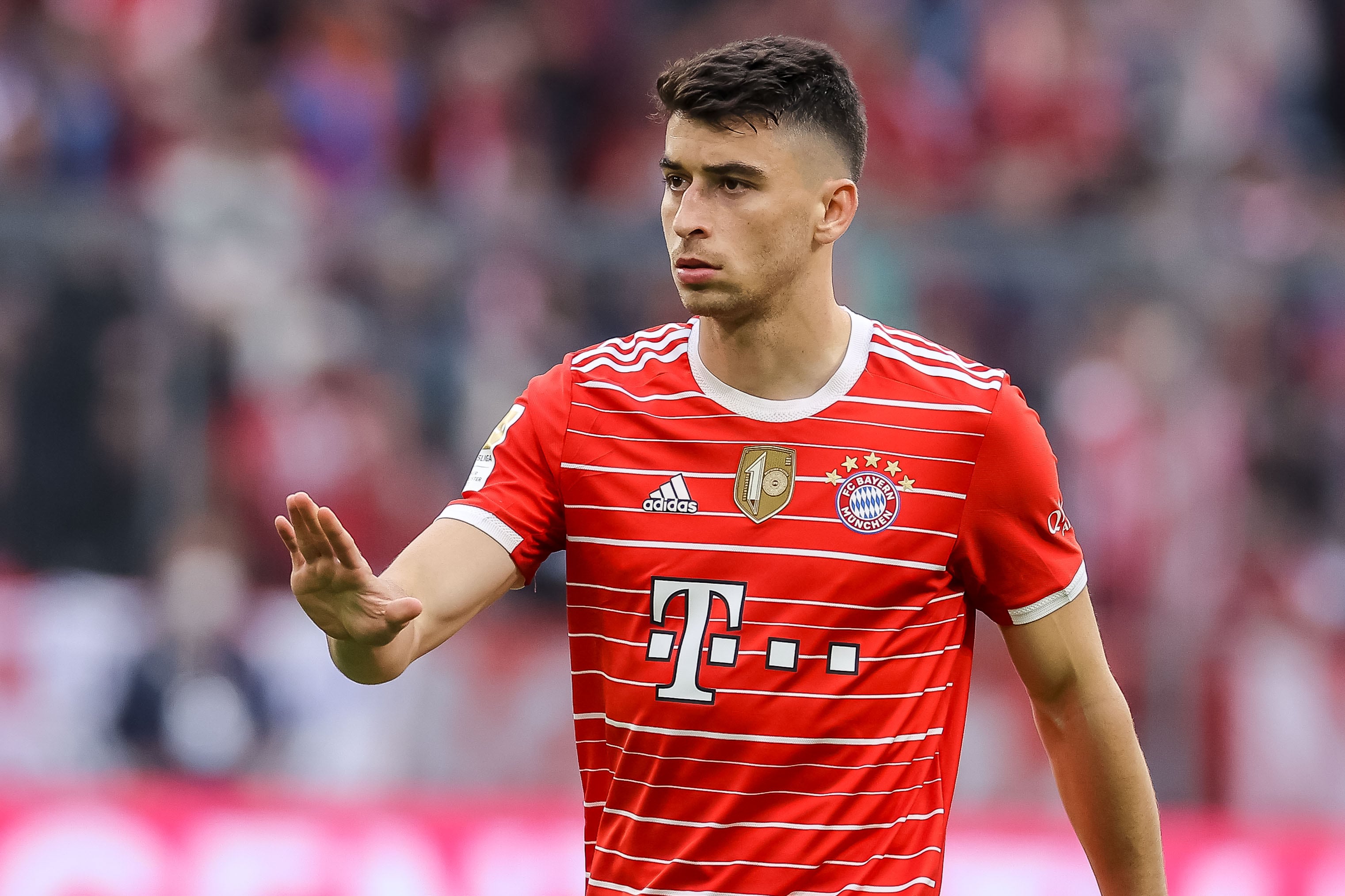 MUNICH, GERMANY - MAY 08: Marc Roca of Bayern Muenchen gestures during the Bundesliga match between FC Bayern München and VfB Stuttgart at Allianz Arena on May 8, 2022 in Munich, Germany. (Photo by Roland Krivec/vi/DeFodi Images via Getty Images)