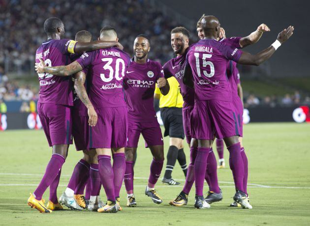 Los jugadores del Manchester City celebran su primer gol frente al Real Madrid.