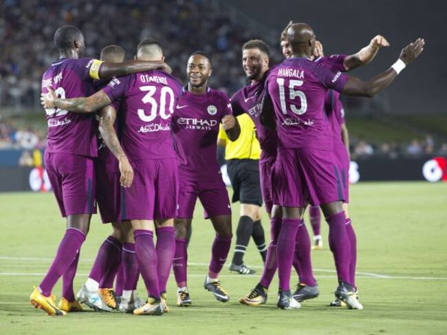 Los jugadores del Manchester City celebran su primer gol frente al Real Madrid.