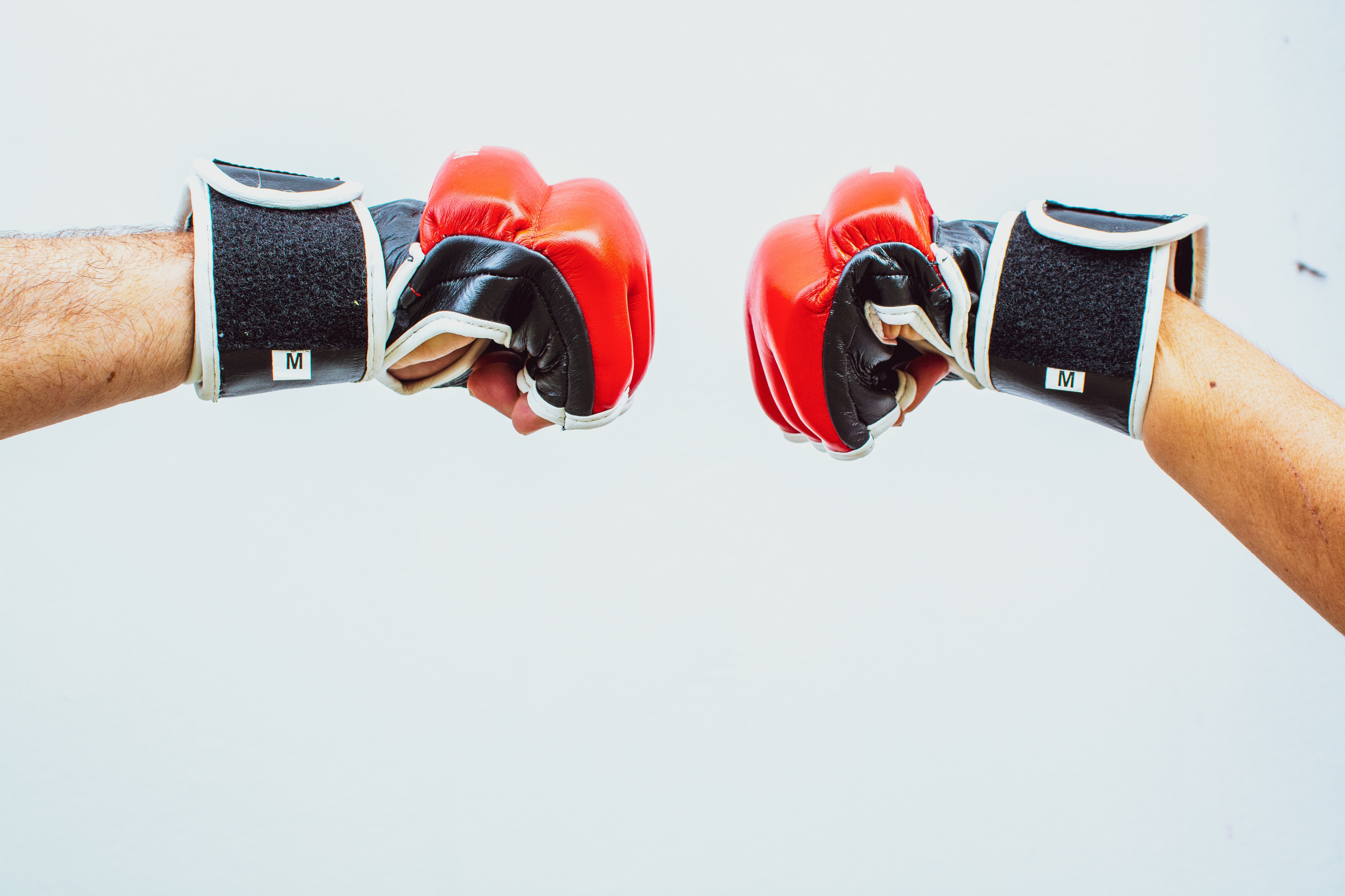 two hands with boxing gloves