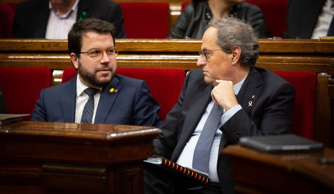 El vicepresidente y el presidente de la Generalitat: Pere Aragonès y Quim Torra (archivo)