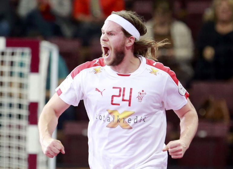 Mikkel Hansen of Denmark celebrates a goal against Russia during the preliminary round of the 24th men&#039;s handball World Championship in Doha January 22, 2015. REUTERS/Mohammed Dabbous (QATAR  - Tags: SPORT HANDBALL)  