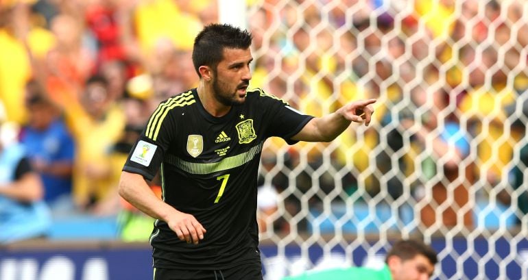 David Villa celebra un gol con la selección española