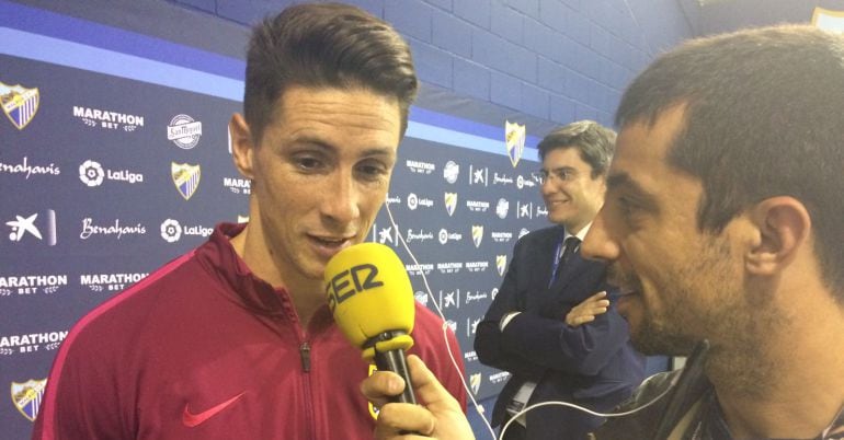 Fernando Torres en la zona mixta con Pedro Fullana