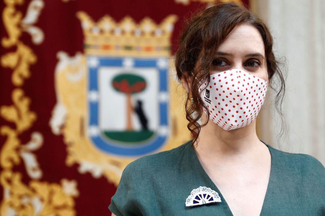 La presidenta de la Comunidad de Madrid, Isabel Díaz Ayuso, asiste a los actos conmemorativos de la festividad de la Virgen de la Paloma, en los que se hace entrega de las tradicionales "Palomas de Bronce-Bomberos de Madrid", este sábado en la Casa de la Villa.