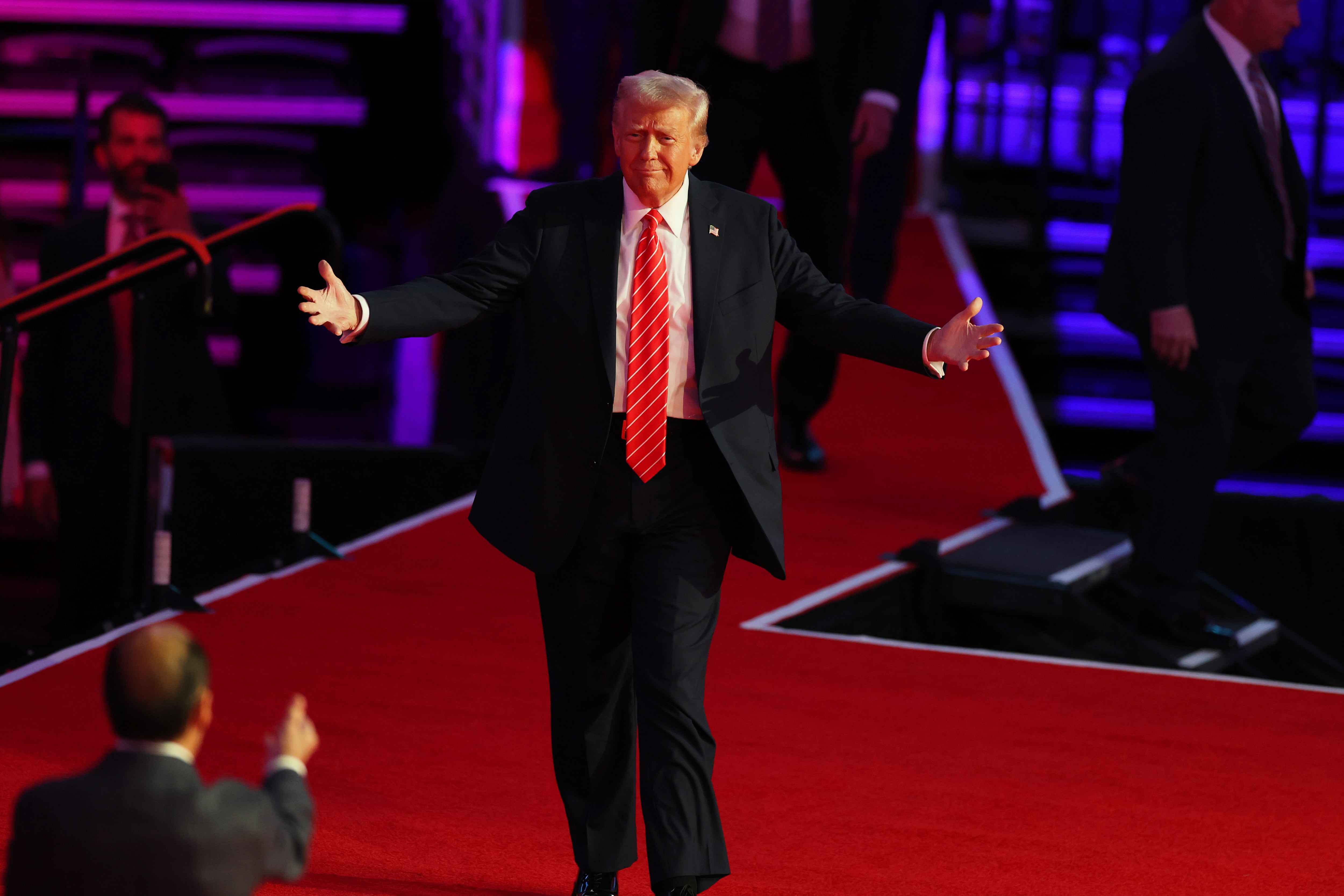 WASHINGTON, DC - JANUARY 19: President-Elect Donald Trump walks to the stage at his victory rally at the Capital One Arena on January 19, 2025 in Washington, DC.  Trump will be sworn in as the 47th U.S. president on January 20. (Photo by Tasos Katopodis/Getty Images)