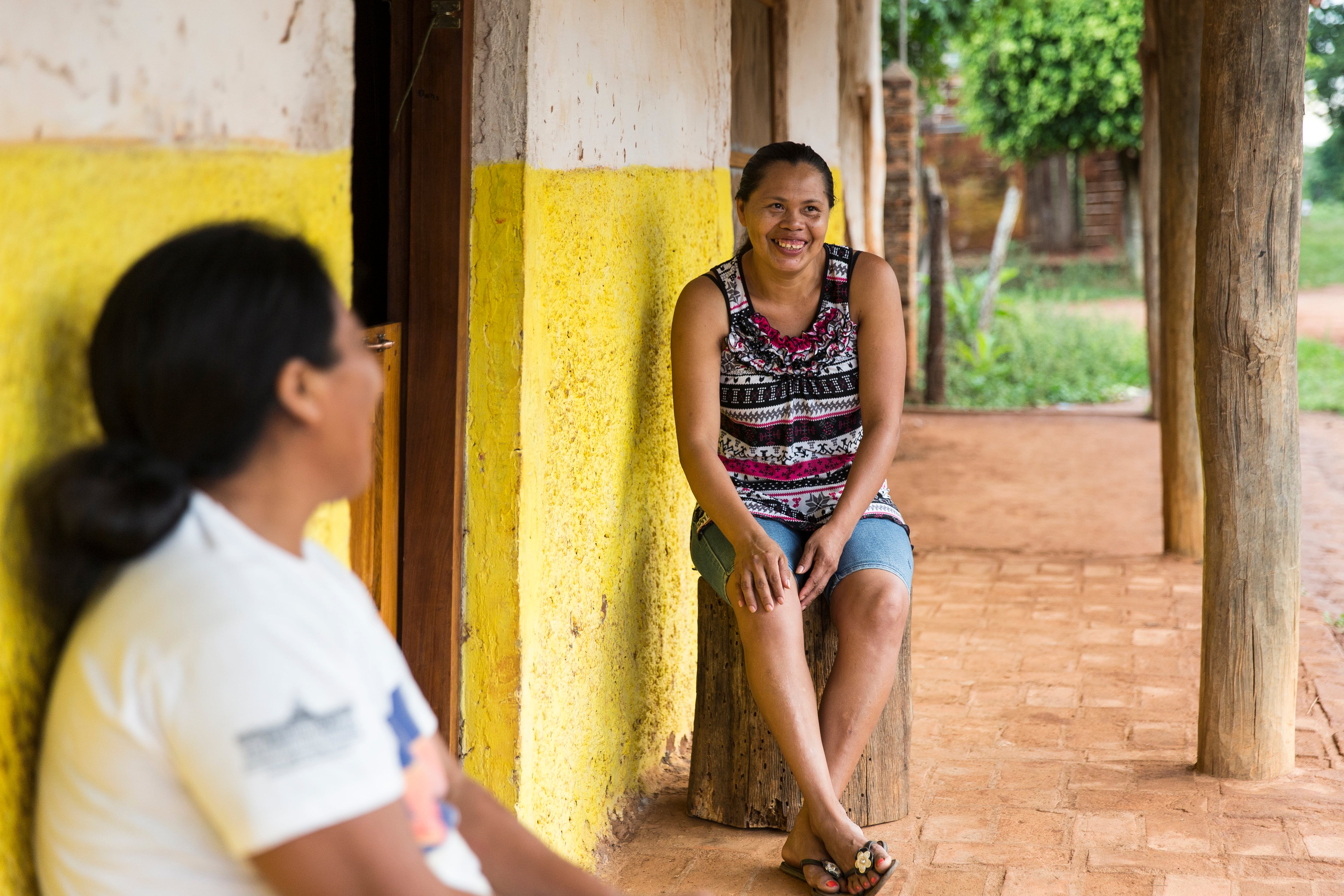 Santa Ana de Velasco, Bolivia - November 24, 2016: Two women  infront of their home in Santa Ana.