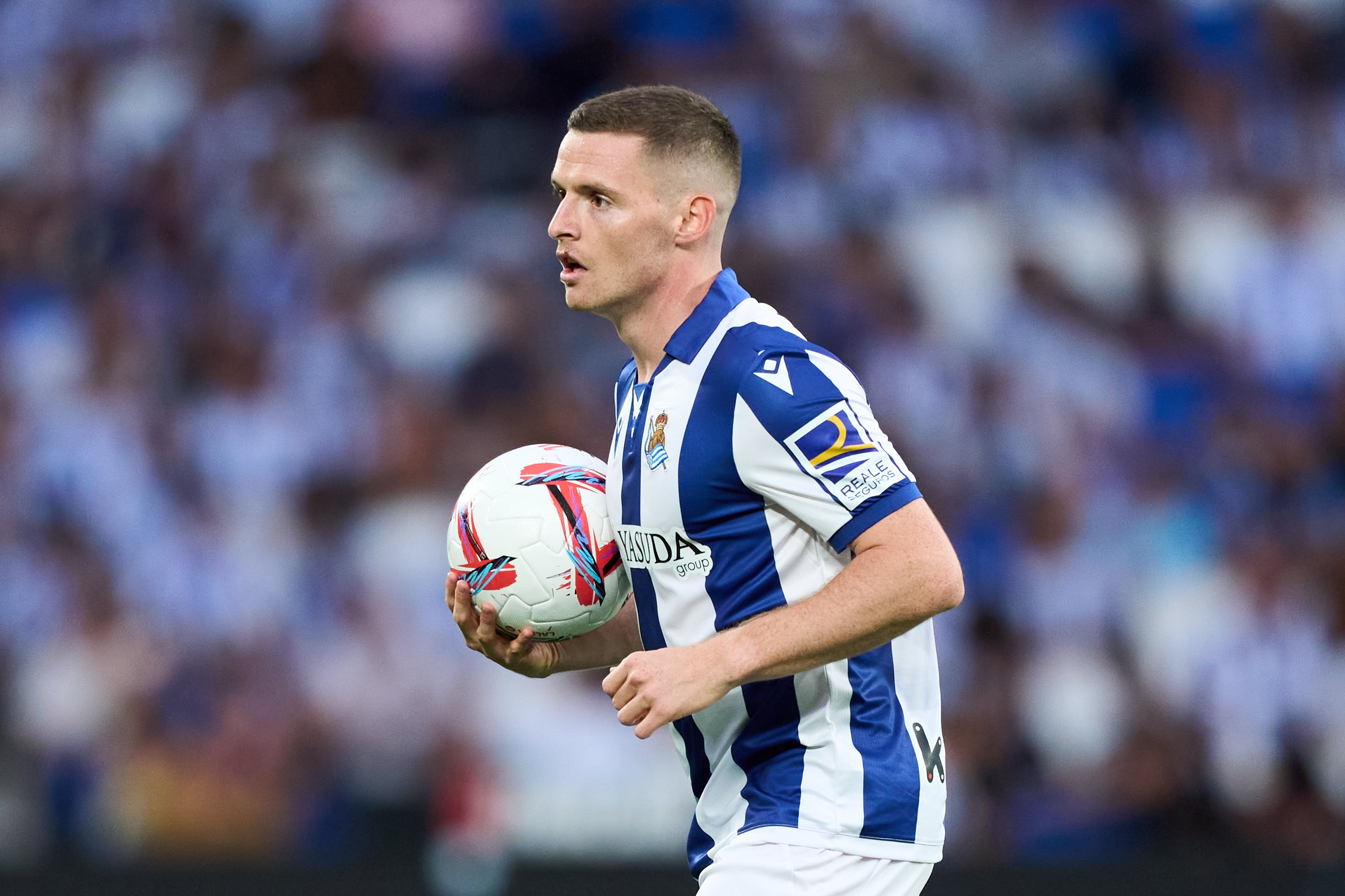 SAN SEBASTIAN, SPAIN - AUGUST 18: Sergio Gomez of Real Sociedad looks on during the La Liga match between Real Sociedad de Fútbol and Rayo Vallecano de Madrid at Reale Arena on August 18, 2024 in San Sebastian, Spain. (Photo by Juan Manuel Serrano Arce/Getty Images)