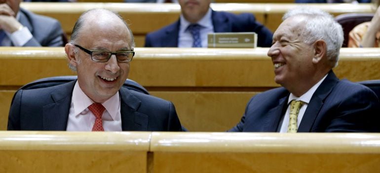 El ministro de Hacienda, Cristóbal Montoro, y el de Exteriores, José Manuel García-Margallo, en una imagen de archivo.