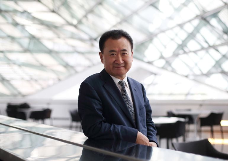 Billionaire Wang Jianlin, chairman and president of Dalian Wanda Group, poses for a portrait at the World Economic Forum Annual Meeting Of The New Champions in Dalian, China, on Wednesday, Sept. 11, 2013. Wang, China&#039;s richest man and owner of the country&#039;s biggest commercial land developer, said he has hired two investment banks to buy hotel management companies, mostly in the U.S. Photographer: Tomohiro Ohsumi/Bloomberg *** Local Caption *** Wang Jianlin