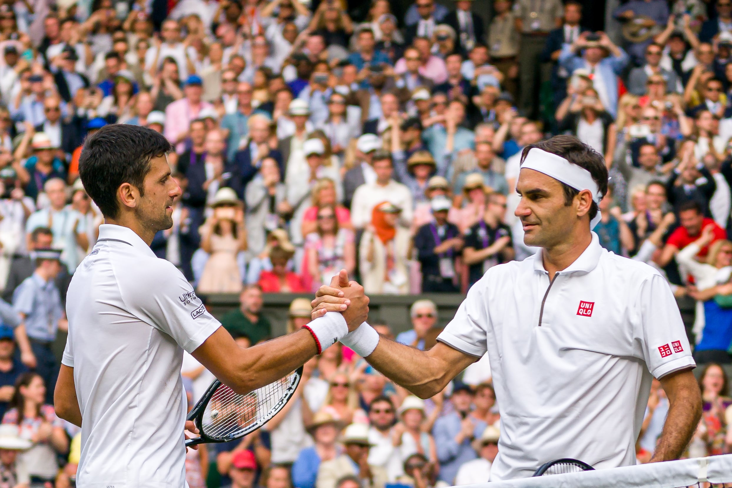 Novak Djokovic y Roger Federer, en la final de Wimbledon de 2019