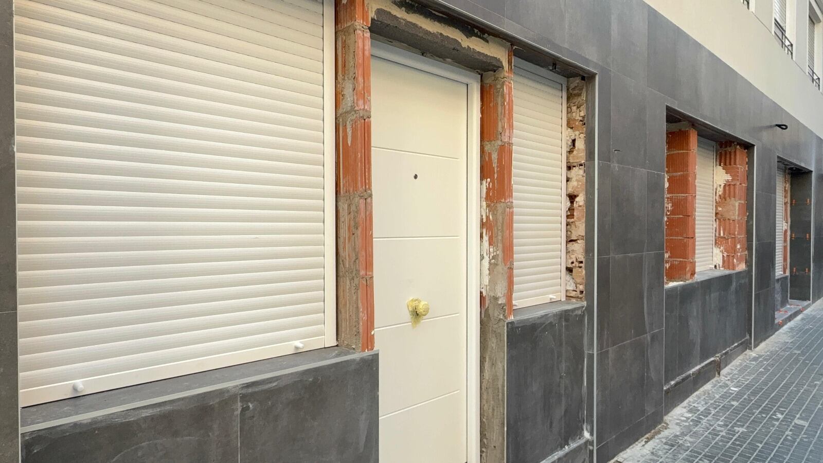 Locales convertidos en vivienda en Elche