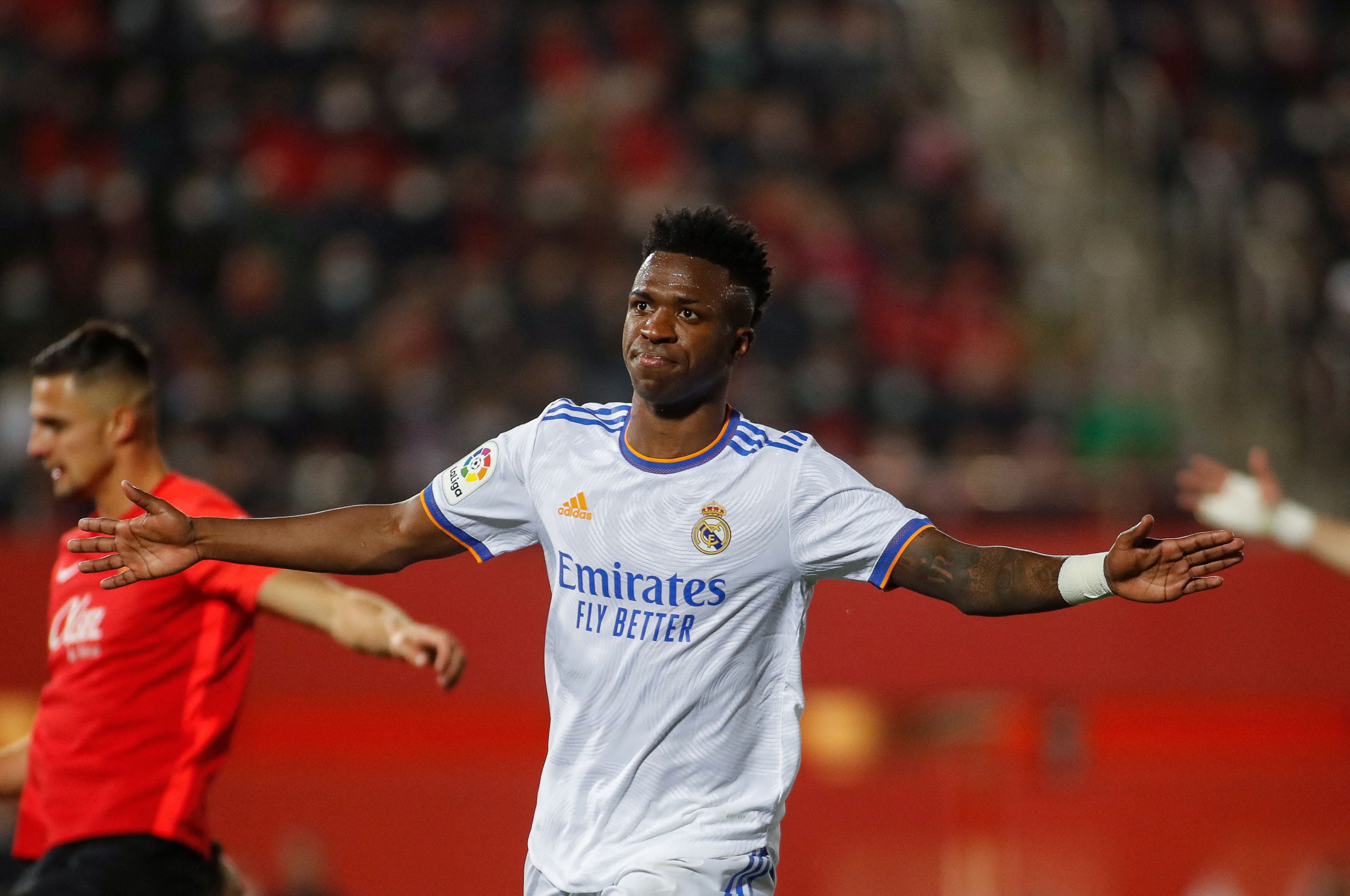 Real Madrid&#039;s Brazilian forward Vinicius Junior celebrates after scoring his team&#039;s first goal during the Spanish League football match between RCD Mallorca and Real Madrid CF at the Son Moix stadium in Palma de Mallorca on March 14, 2022. (Photo by JAIME REINA / AFP) (Photo by JAIME REINA/AFP via Getty Images)