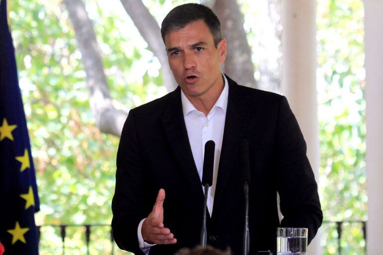 El presidente del Gobierno español, Pedro Sánchez, durante la rueda de prensa que ofrece junto con la canciller alemana, Ángela Merkel.