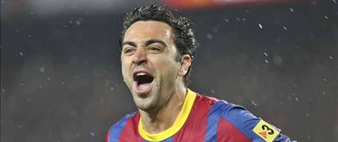 Xavi, durante un partido con el Barça