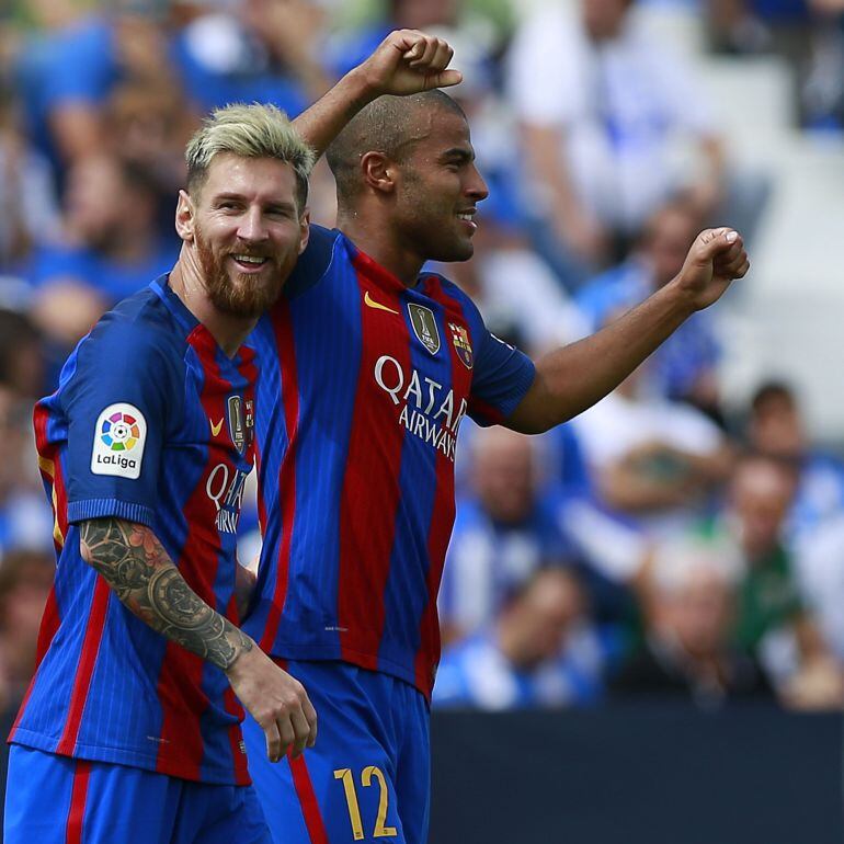 Rafael Alcantara alias Rafinha (R) of FC Barcelona celebrates scoring their fifth goal with teammate Lionel Messi (L) during the La Liga match between Deportivo Leganes and FC Barcelona at Estadio Municipal de Butarque on September 17, 2016 in Leganes, Sp