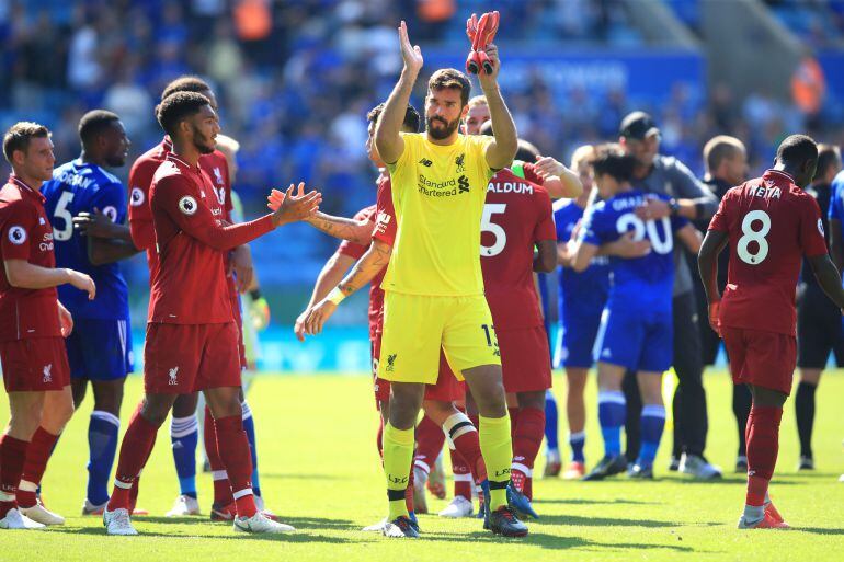 Alisson of Liverpool applauds fans after the Premier League match between Leicester City and Liverpool FC at The King Power Stadium on September 1, 2018 in Leicester, United Kingdom. 