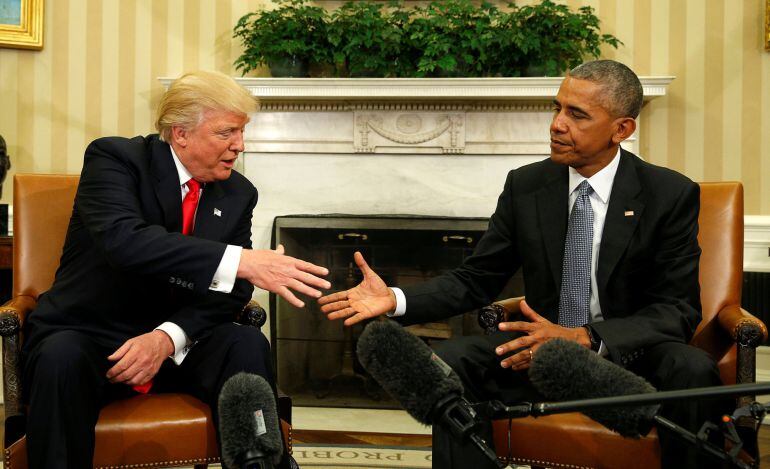 U.S. President Barack Obama meets with President-elect Donald Trump in the Oval Office of the White House in Washington Novembe