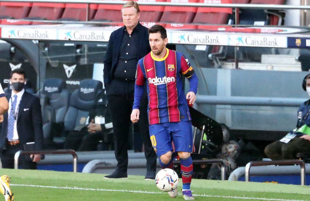 Ronald Koeman y Leo Messi.