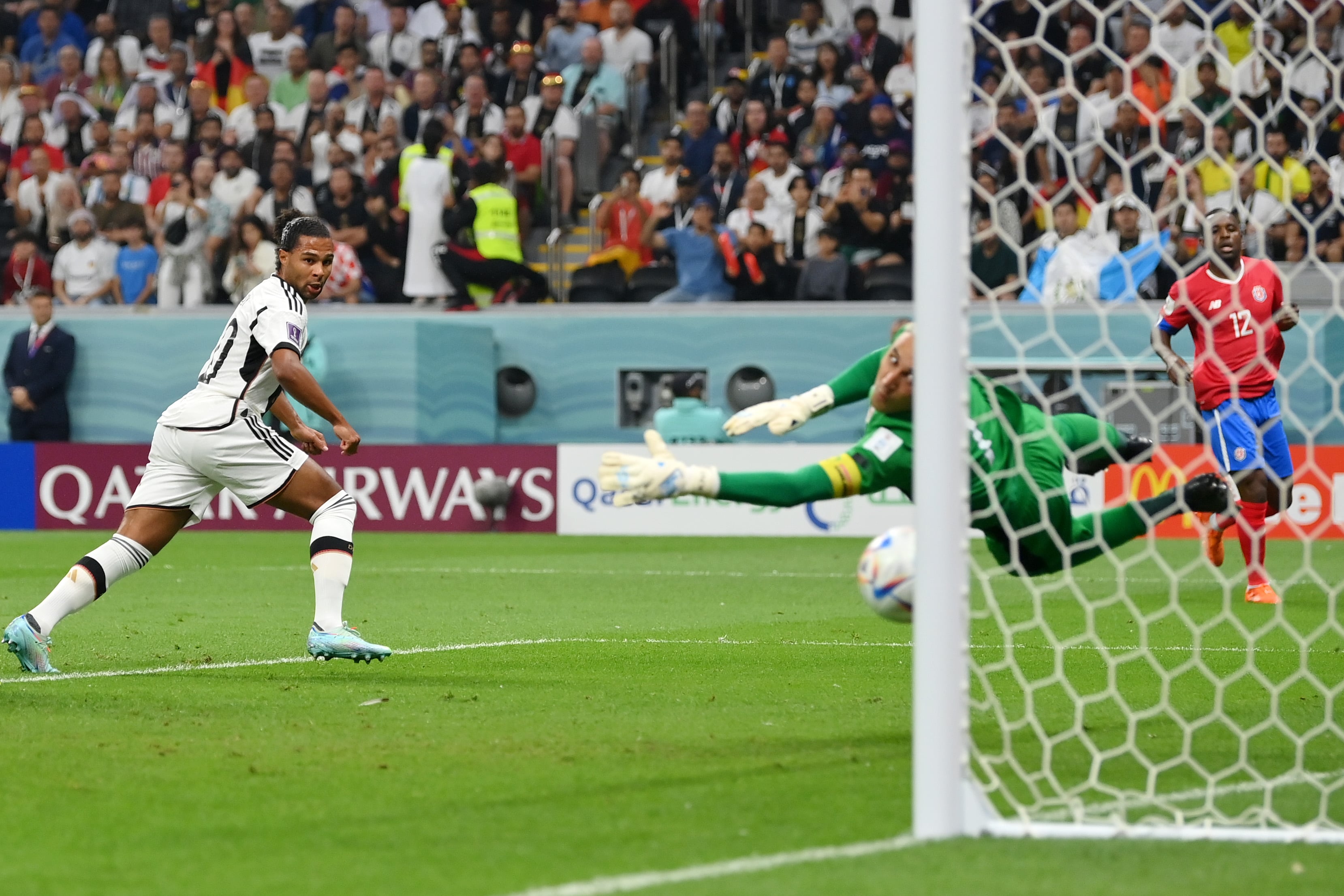 AL KHOR, QATAR - DECEMBER 01: Serge Gnabry of Germany scores the team&#039;s first goal during the FIFA World Cup Qatar 2022 Group E match between Costa Rica and Germany at Al Bayt Stadium on December 01, 2022 in Al Khor, Qatar. (Photo by Dan Mullan/Getty Images)