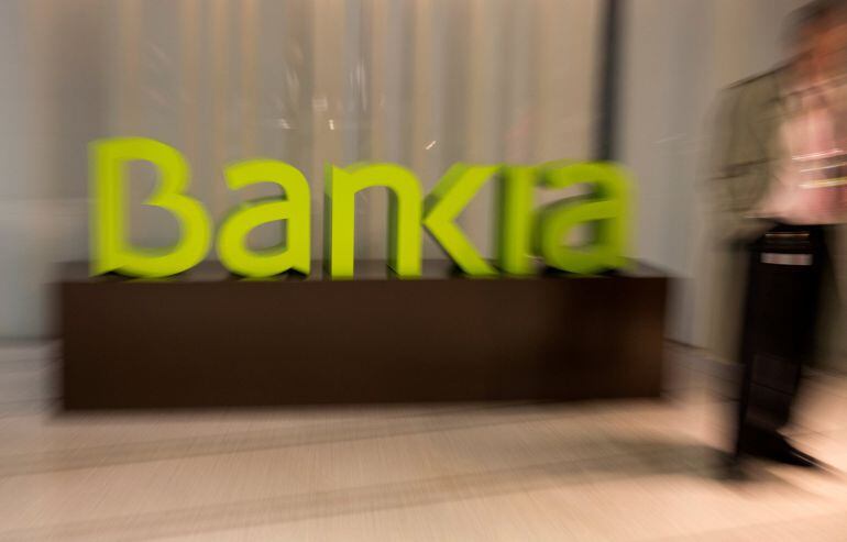 FILE PHOTO: Spain&#039;s Bankia logo is seen inside bank&#039;s headquarters before a news conference to present their annual results in Madrid, Spain, January 30, 2017. REUTERS Sergio PerezFile Photo                              GLOBAL BUSINESS WEEK AHEAD        S