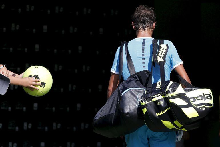 Mar 26, 2016; Key Biscayne, FL, USA; Rafael Nadal leaves the court after retiring from his match against Damir Dzumhur (not pictured) on day five of the Miami Open at Crandon Park Tennis Center. Dzumhur won 2-6, 6-4, 3-0(ret.). Mandatory Credit: Geoff Bur