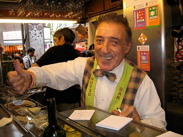 Shop owner Pinotxo Bar. Barcelona, Spain 