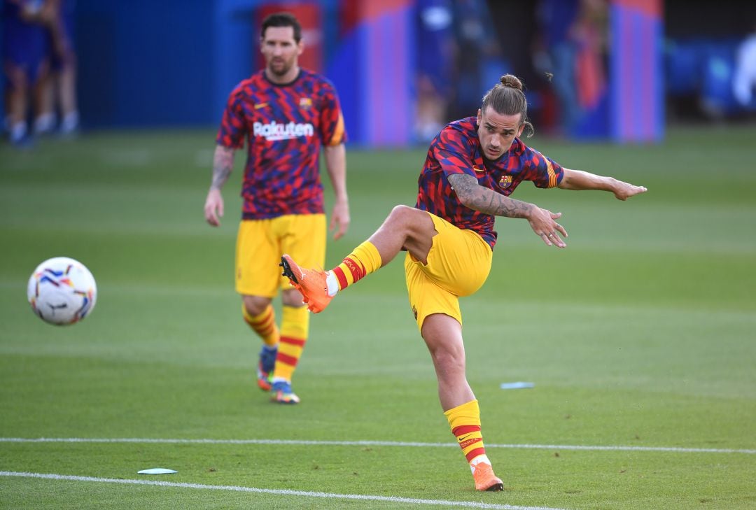 Antoine Griezmann y Leo Messi