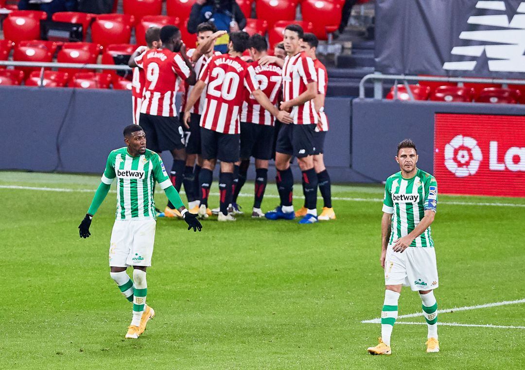 Joaquin Sanchez and Emerson Aparecido of Real Betis Balompie after receives a goal during the Spanish league, La Liga Santander, football match played between Athletic Club and Real Betis Balompie at San Mames stadium on November 23, 2020 in Bilbao, Spain. AFP7