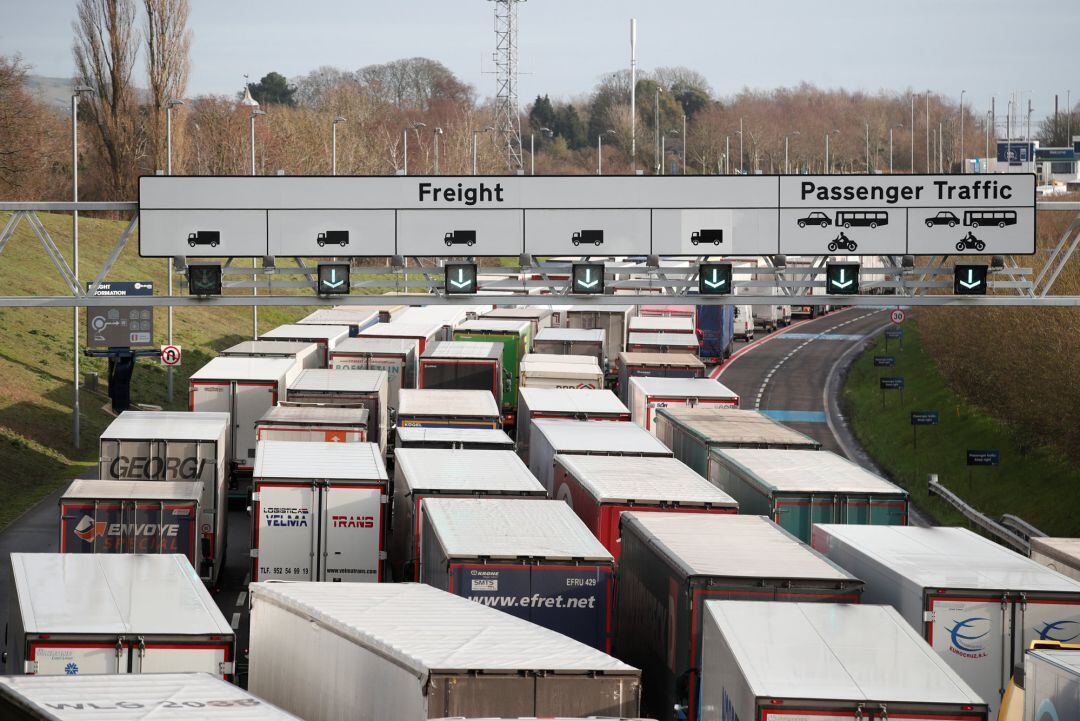 Lorries queue on the M20 motorway to enter the Eurotunnel terminal in Folkestone, Britain