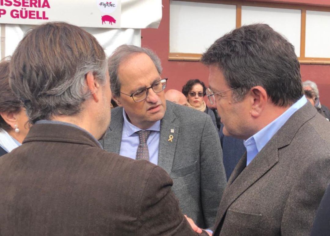 El secretari general de la FECIC, Josep Collado, amb el president de la Generalitat, Quim Torra, en la inauguració de Fiporc