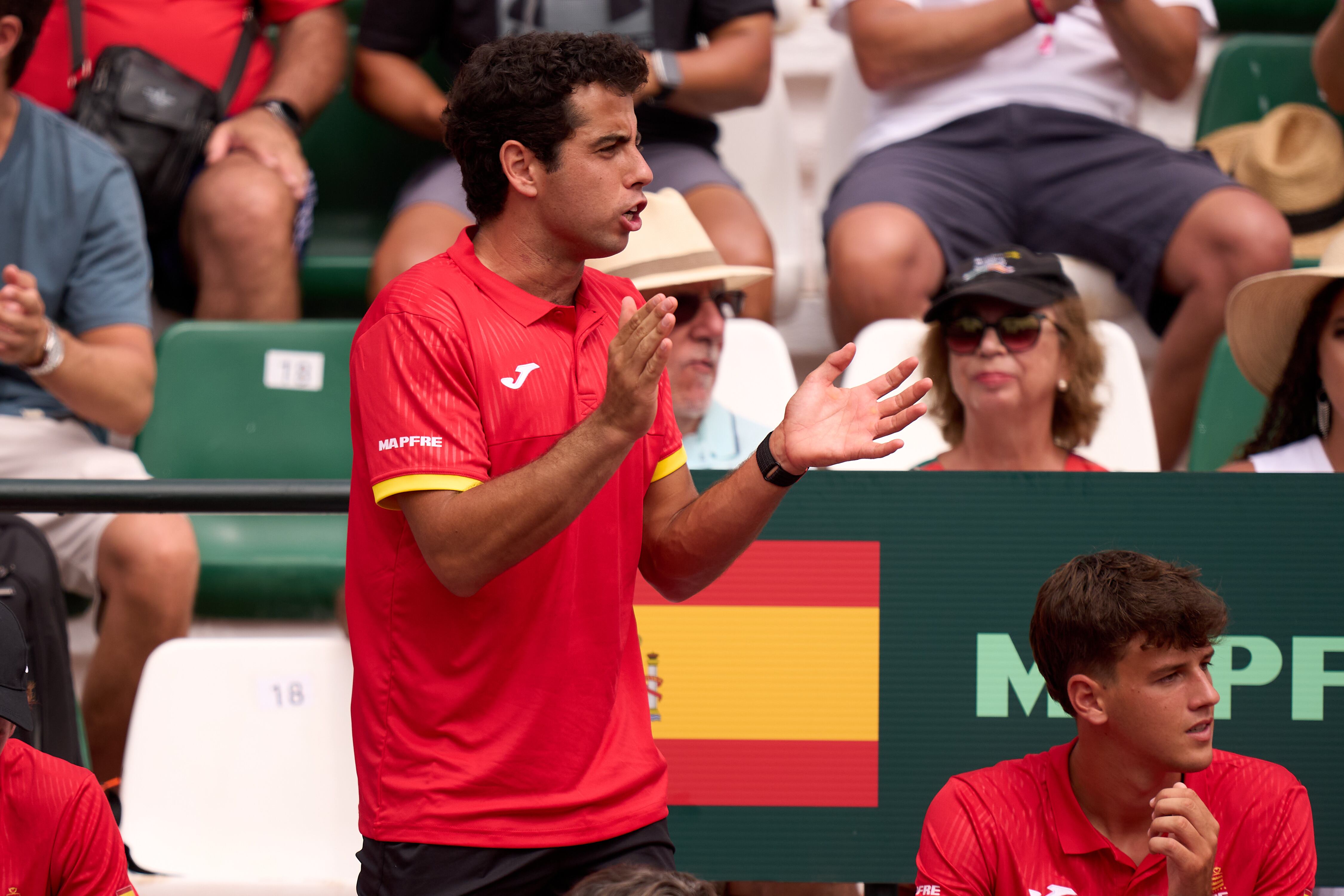 MARBELLA, SPAIN - SEPTEMBER 14: Jaume Munar of Spain cheers on his teammate during the 2025 Davis Cup Qualifier second round match between Spain and Denmark at Club de Tenis Puente Romano on September 14, 2025 in Marbella, Spain. (Photo by Angel Martinez/Getty Images for ITF)