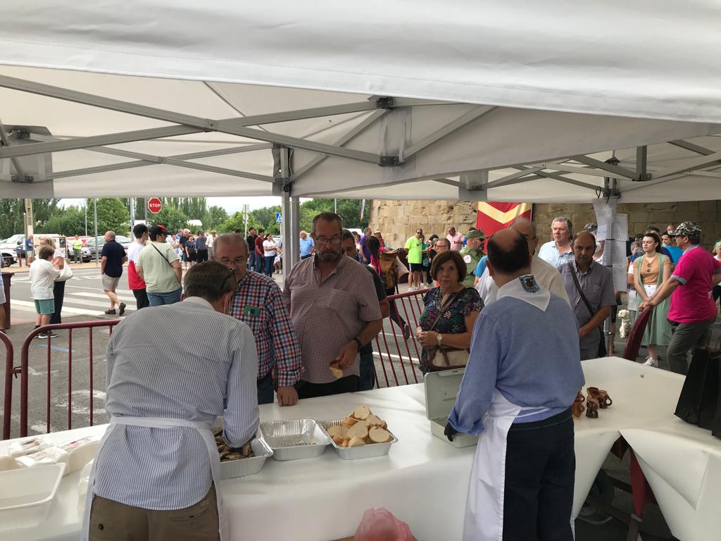 Reparto del pez, el pan y el vino