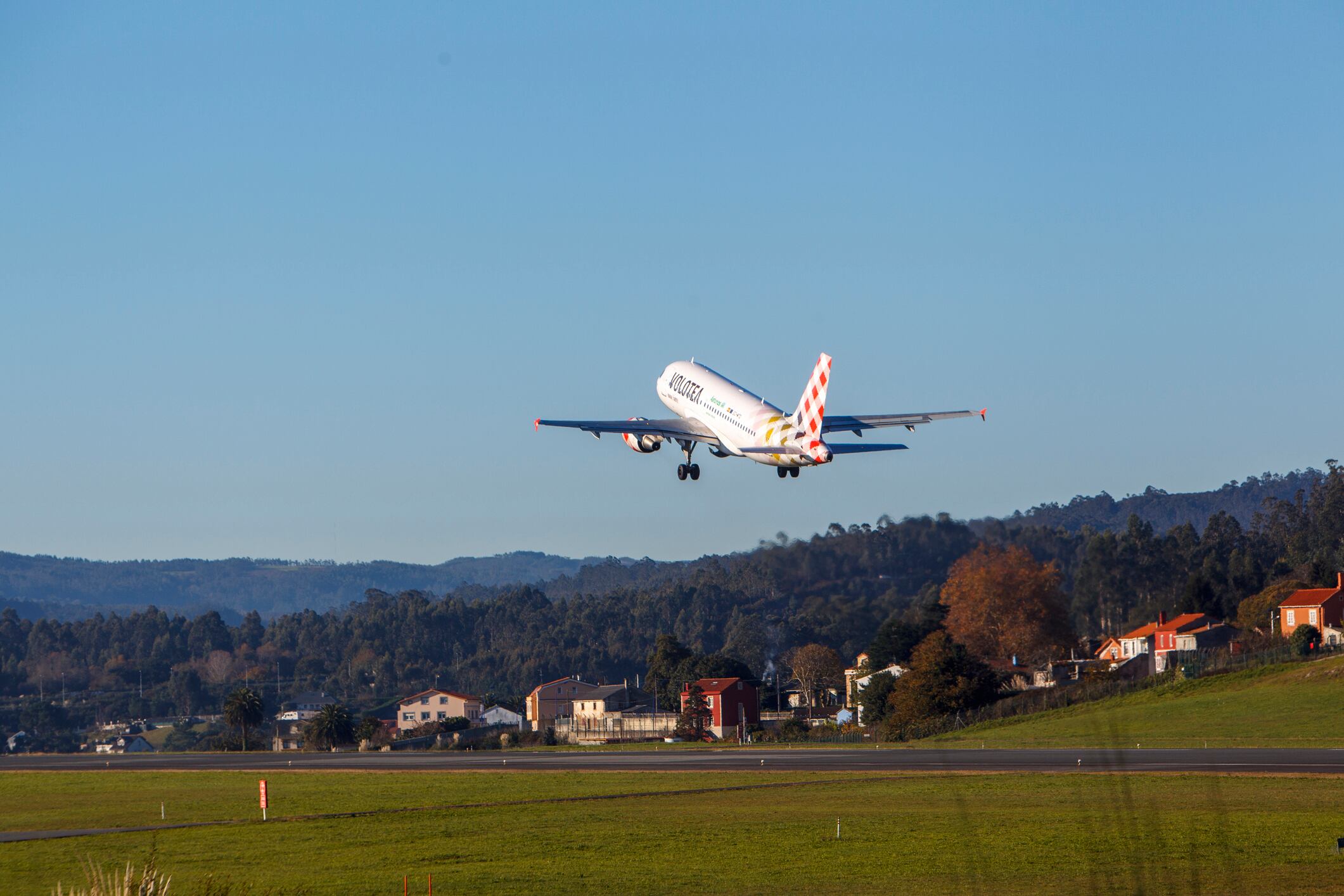 Coruna-Spain -Novembre 19,2021: Airbus A319 Volotea, taking off from Coruna airport (Aeropuerto de Alvedro)